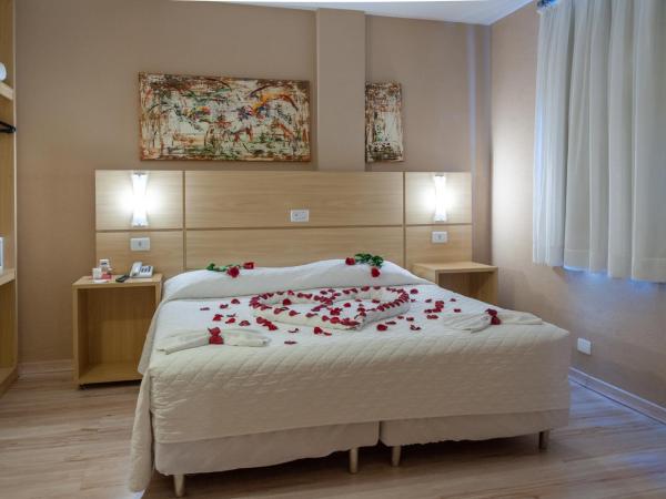 SJ Executive - San Juan Curitiba : photo 3 de la chambre suite