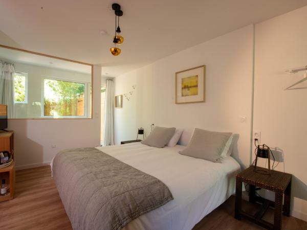 Le Lodge du Cap Ferret : photo 6 de la chambre chambre lit king-size supérieure