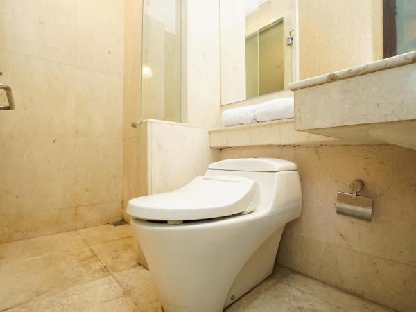 Collection O 252 Istana Permata Ngagel : photo 9 de la chambre chambre lits jumeaux standard