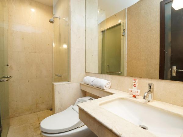 Collection O 252 Istana Permata Ngagel : photo 8 de la chambre chambre lits jumeaux standard