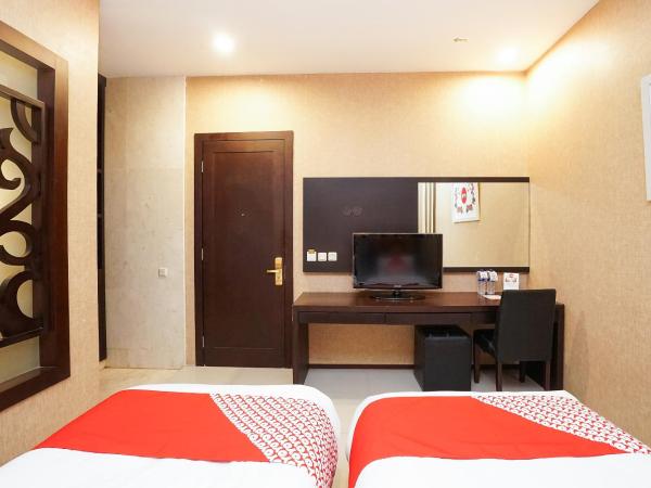 Collection O 252 Istana Permata Ngagel : photo 4 de la chambre chambre lits jumeaux standard