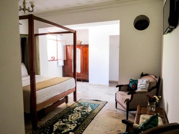 Casa Perpetua Hotel D Charm : photo 1 de la chambre chambre double avec lit d'appoint