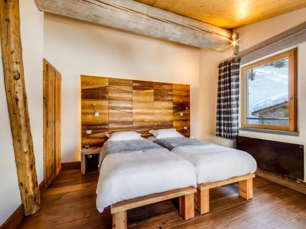 Chalet Hotel Du Fornet : photo 4 de la chambre chambre lits jumeaux supérieure