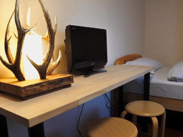 SappoLodge : photo 1 de la chambre chambre lits jumeaux avec salle de bains