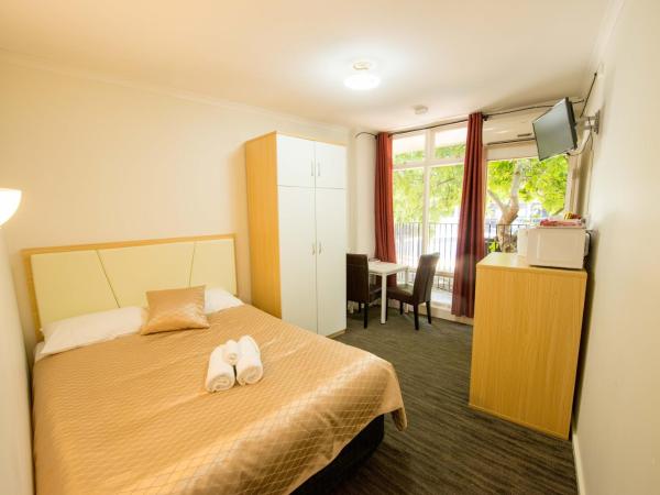 Jacksons Motor Inn : photo 1 de la chambre chambre lit queen-size standard avec spa