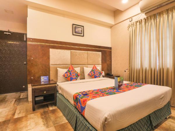 FabHotel Frazer Suites Pulikeshi Nagar : photo 1 de la chambre chambre deluxe