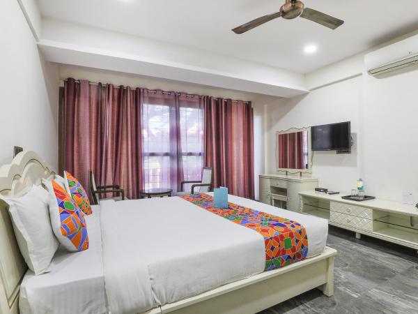 FabHotel Frazer Suites Pulikeshi Nagar : photo 2 de la chambre chambre triple exécutive