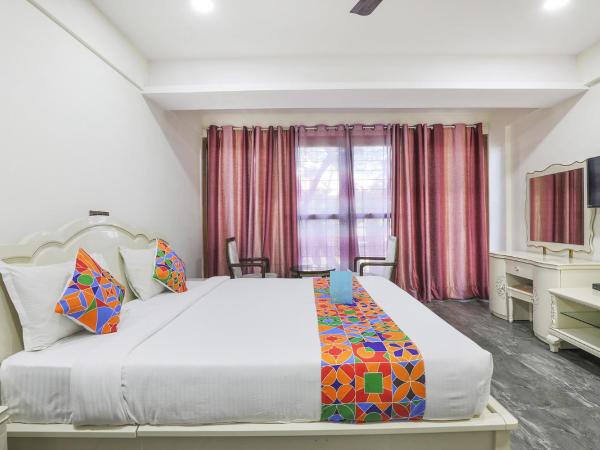 FabHotel Frazer Suites Pulikeshi Nagar : photo 3 de la chambre chambre triple exécutive