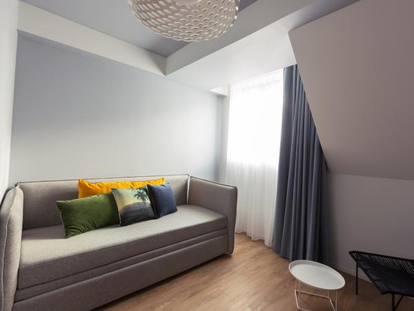 Golden Tulip Saint Malo– Le Grand Bé : photo 2 de la chambre suite