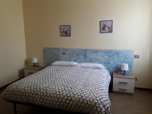 La Casa Nel Verde 2 : photo 10 de la chambre chambre double ou lits jumeaux avec salle de bains privative externe