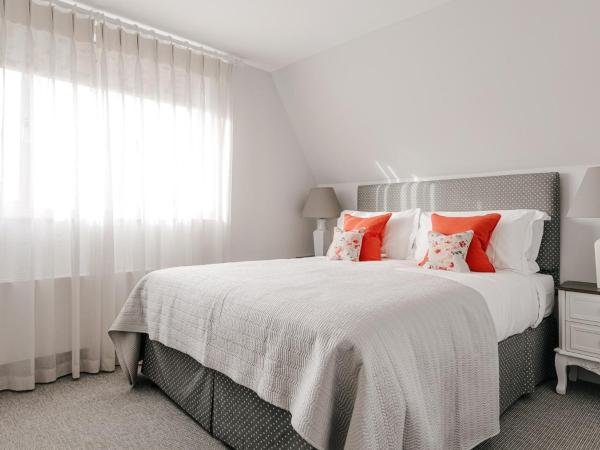 Tyndall Villa Boutique B&B : photo 2 de la chambre hébergement lit king-size classique - vue sur ville