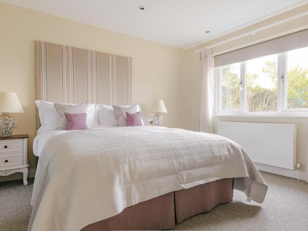 Tyndall Villa Boutique B&B : photo 1 de la chambre hébergement double supérieur avec baignoire