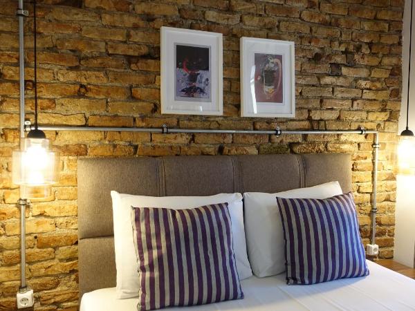 Mono Hotel : photo 2 de la chambre chambre double ou lits jumeaux - vue sur ville