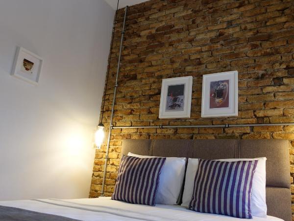 Mono Hotel : photo 3 de la chambre chambre double ou lits jumeaux - vue sur ville