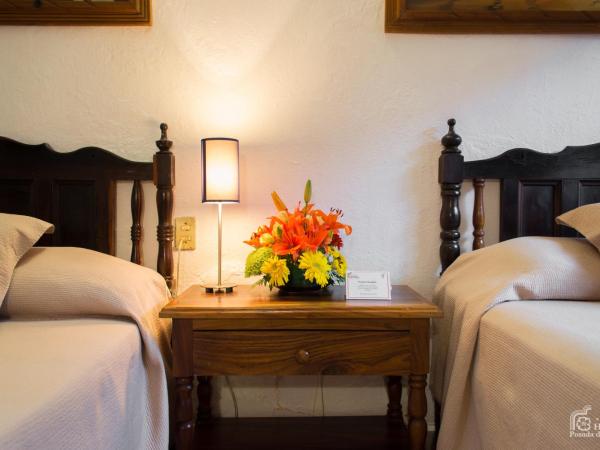 Hotel Posada De Roger : photo 2 de la chambre chambre double avec 2 lits doubles