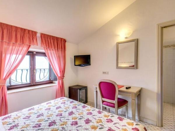 Hotel La Badia : photo 1 de la chambre petite chambre double ou lits jumeaux