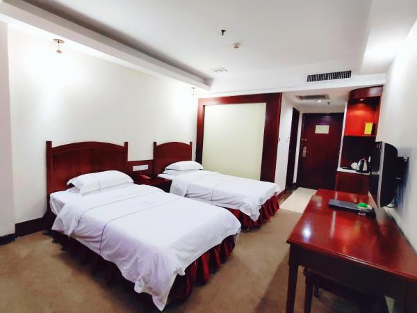 Guangzhou Junshan Hotel - Shuttle bus for Canton Fair : photo 1 de la chambre chambre double ou lits jumeaux avec douche