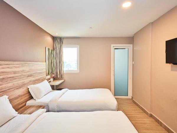 ibis budget Singapore Crystal : photo 3 de la chambre chambre triple supérieure