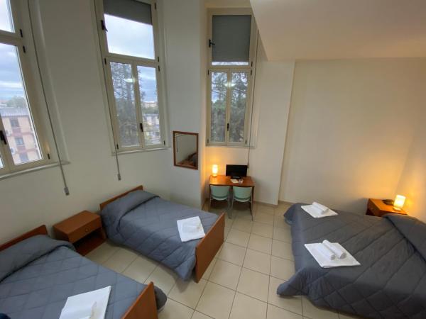 Casa per Ferie Sant'Anna : photo 3 de la chambre chambre quadruple avec salle de bains privative