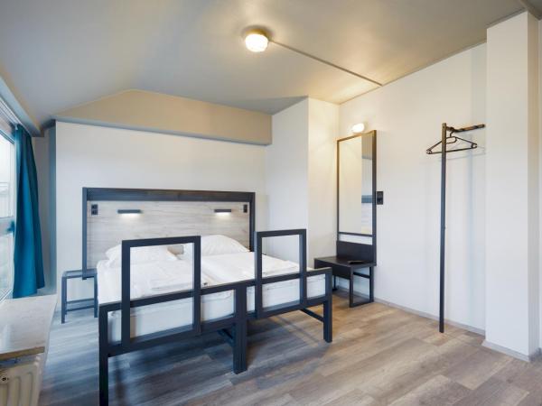 a&o Düsseldorf Hauptbahnhof : photo 1 de la chambre chambre lits jumeaux