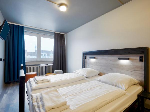 a&o Düsseldorf Hauptbahnhof : photo 2 de la chambre chambre lits jumeaux