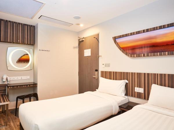 ibis budget Singapore Selegie : photo 2 de la chambre chambre lits jumeaux cabine

