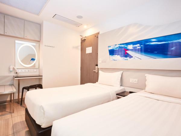 ibis budget Singapore Selegie : photo 1 de la chambre chambre lits jumeaux cabine


