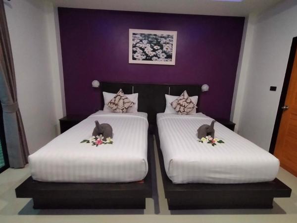 Lanta Daisy Residence : photo 5 de la chambre chambre double ou lits jumeaux standard - vue sur jardin