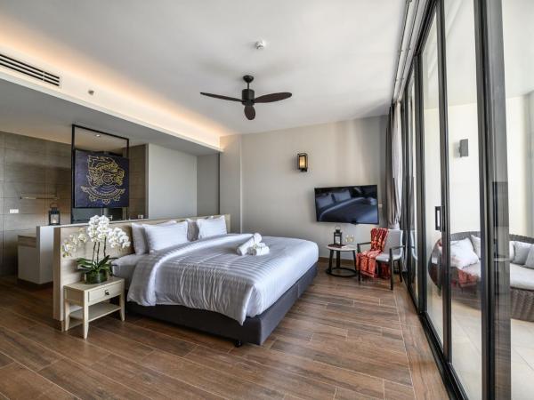 iSanook Resort & Suites Hua Hin : photo 1 de la chambre suite avec baignoire spa