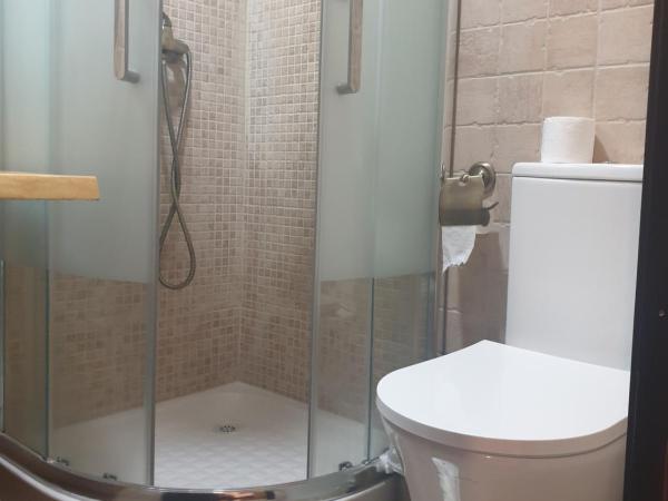 Hostal El Descanso : photo 3 de la chambre chambre triple