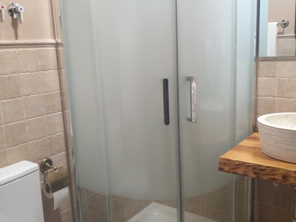 Hostal El Descanso : photo 1 de la chambre chambre triple