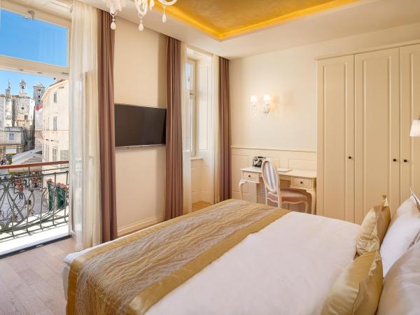 Piazza Heritage Hotel : photo 4 de la chambre chambre double ou lits jumeaux de luxe avec balcon et vue sur la ville