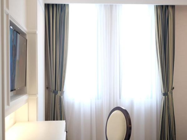 Hotel Des Indes Menteng : photo 4 de la chambre grande chambre deluxe lits jumeaux