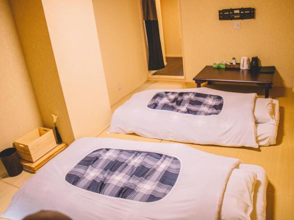 和正堂・禅 : photo 3 de la chambre chambre lits jumeaux avec salle de bains