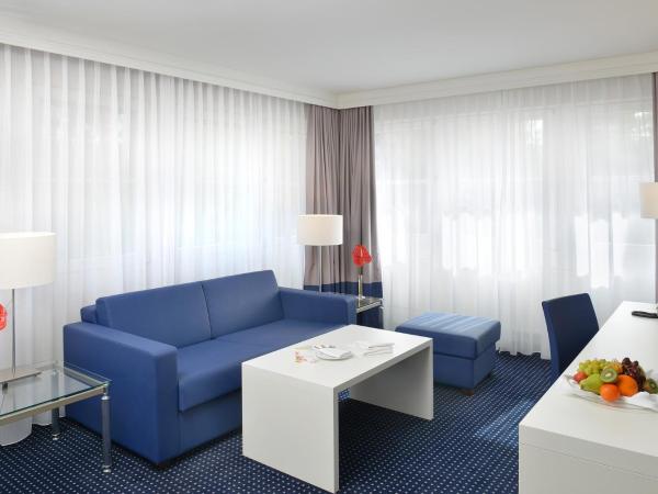 relexa Waldhotel Schatten Stuttgart : photo 1 de la chambre suite junior