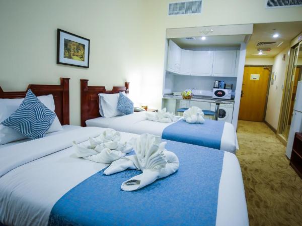 Green House Hotel Suites & Apartment : photo 7 de la chambre chambre deluxe double ou lits jumeaux