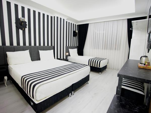 Cnr İnci Hotel : photo 5 de la chambre chambre deluxe double ou lits jumeaux
