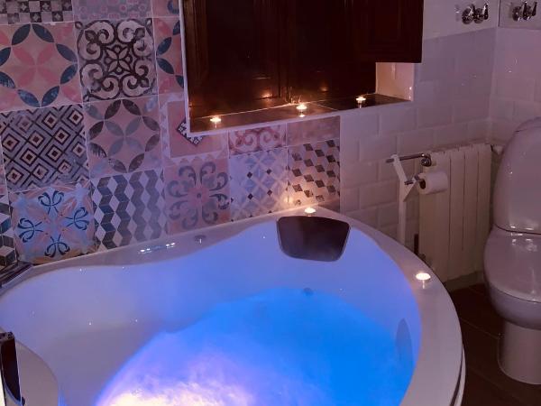 Hotelito Suecia : photo 8 de la chambre chambre lit queen-size avec baignoire spa