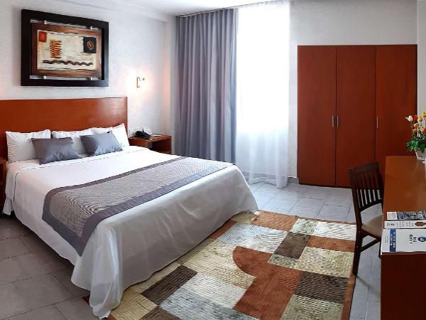 Best Western Global Express : photo 2 de la chambre suite lit king-size avec pièce à vivre