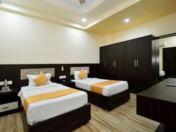 Kapish Home-All Pure Veg : photo 3 de la chambre chambre lits jumeaux standard