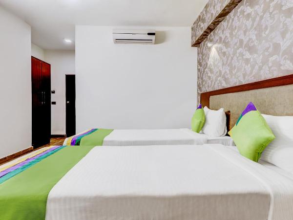 Treebo Paul's Inn : photo 9 de la chambre [sanitized] deluxe double or twin room