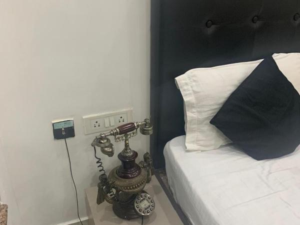 Red inn : photo 8 de la chambre deluxe double room with bath - indian nationals only