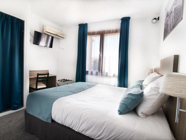 Maison des Croisades : photo 2 de la chambre chambre double ou lits jumeaux - vue sur jardin