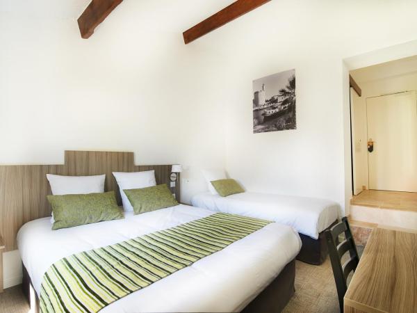 Maison des Croisades : photo 1 de la chambre chambre triple - vue sur canal