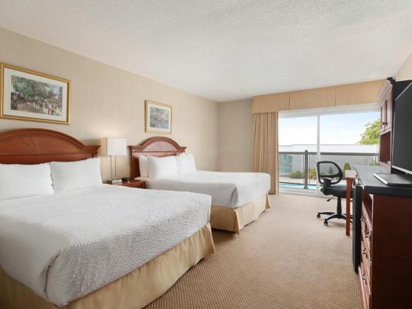 Days Inn by Wyndham London : photo 2 de la chambre chambre standard avec 2 lits queen-size - vue sur piscine - non-fumeurs