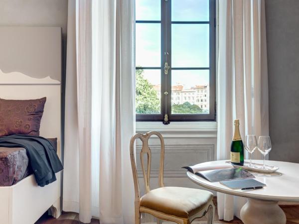 Palazzo D'Oltrarno - Residenza D'Epoca : photo 3 de la chambre suite junior - vue sur jardin