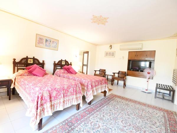 Hotel Meghniwas : photo 7 de la chambre chambre deluxe double ou lits jumeaux