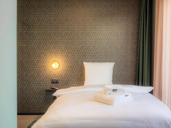 BLOOM Boutique Hotel & Lounge Basel : photo 4 de la chambre chambre simple avec terrasse