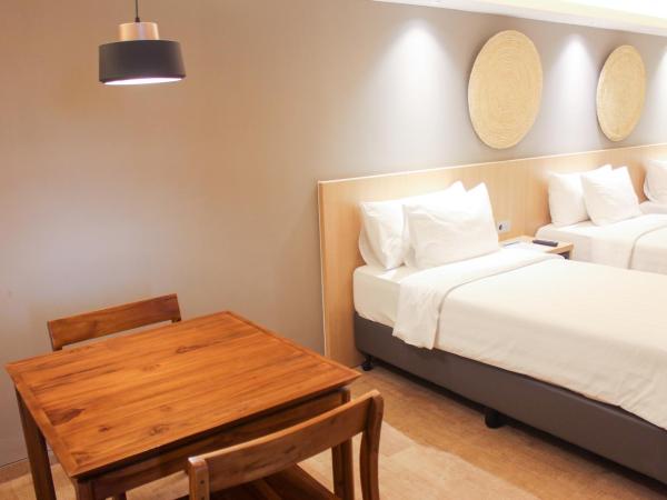 Aveta Hotel Malioboro : photo 4 de la chambre chambre triple familiale