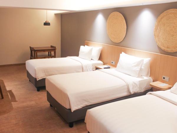 Aveta Hotel Malioboro : photo 3 de la chambre chambre triple familiale